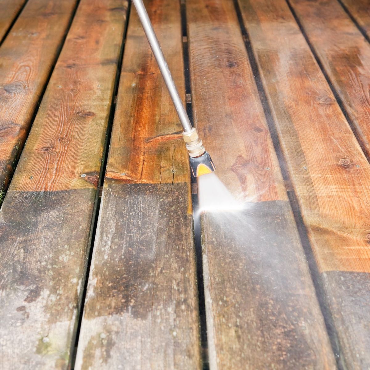 Close-up decking pressure wash result